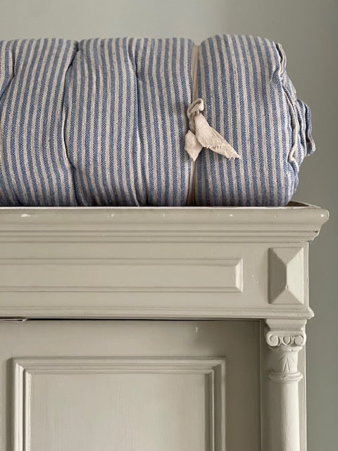 Maitri: Cream and blue striped mattress